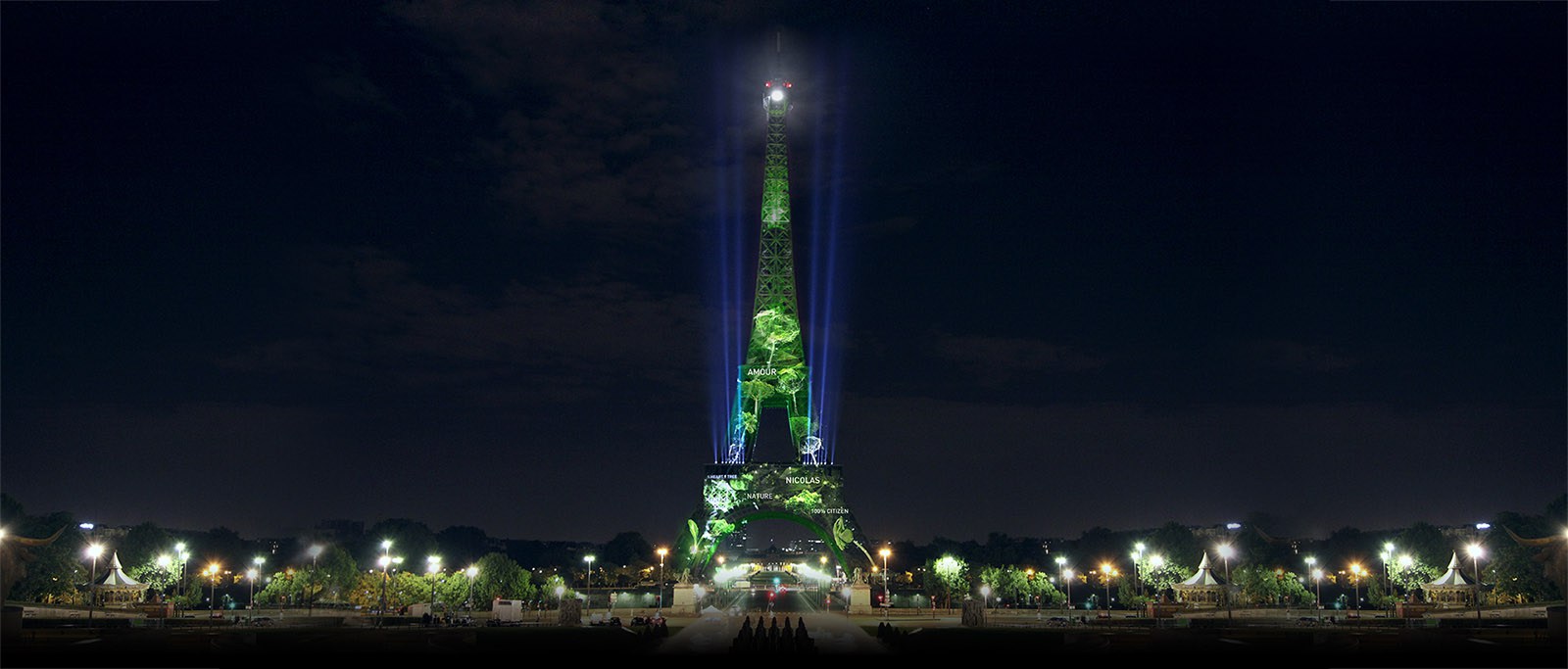 Eiffel Tower Lit with Green Trees